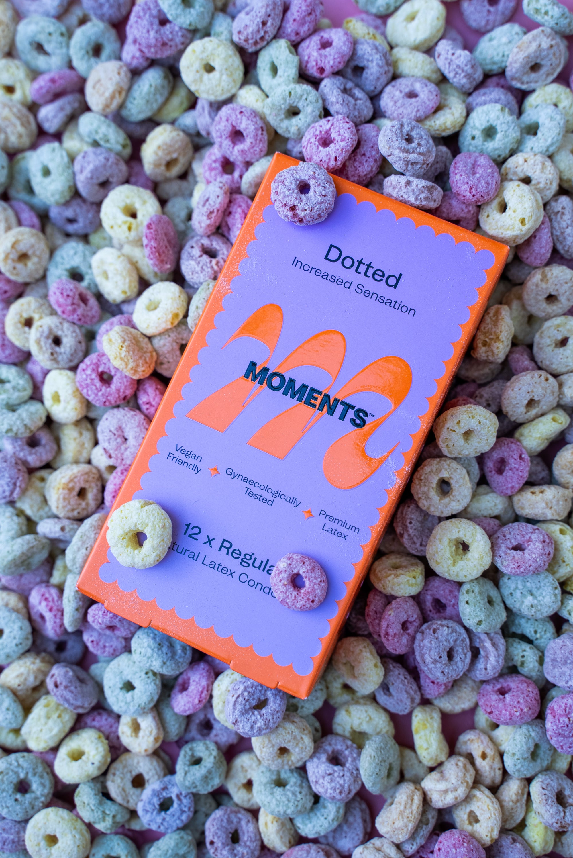 Moments Dotted condoms advertised as a new product with a fruit-themed design